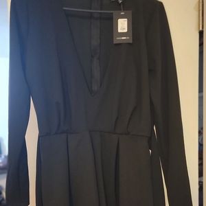 Woman's Clothing.  Fashion Nova Black Romper XL